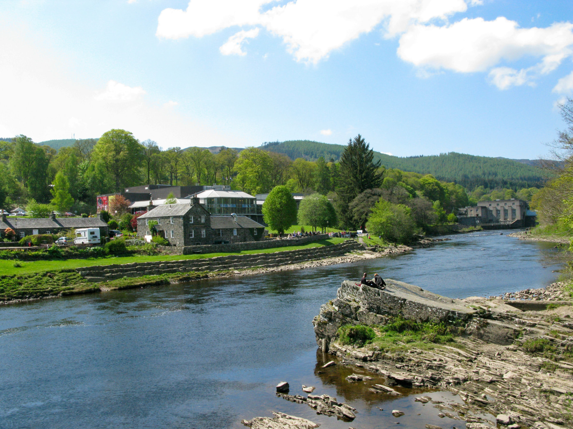 The River Tay running through a Perthshire town on a bright summer day